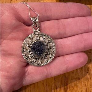 Elegant Silver Pendant Necklace with Raw Amethyst and Silver Filigree